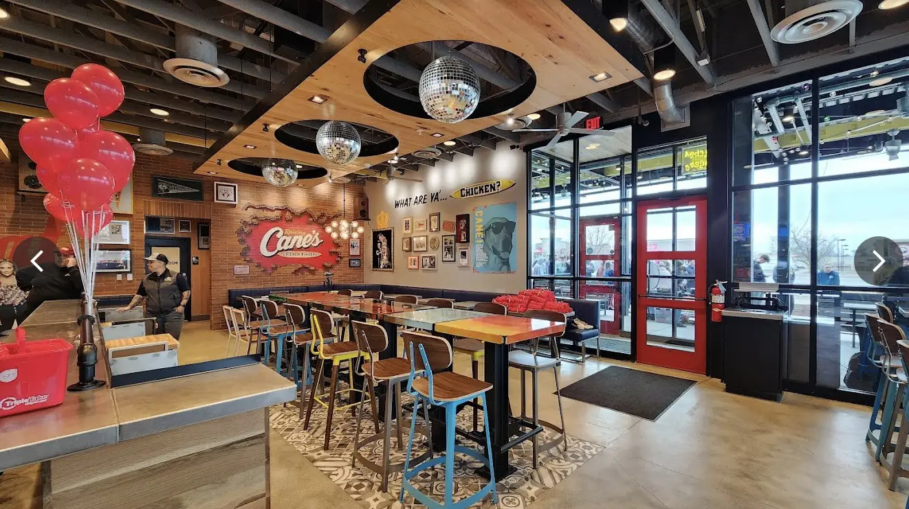 Looking for a reliable commercial painting contractor in Coralville, IA? Henry's Painting can transform your restaurant interior, like this Raising Cane's location. 